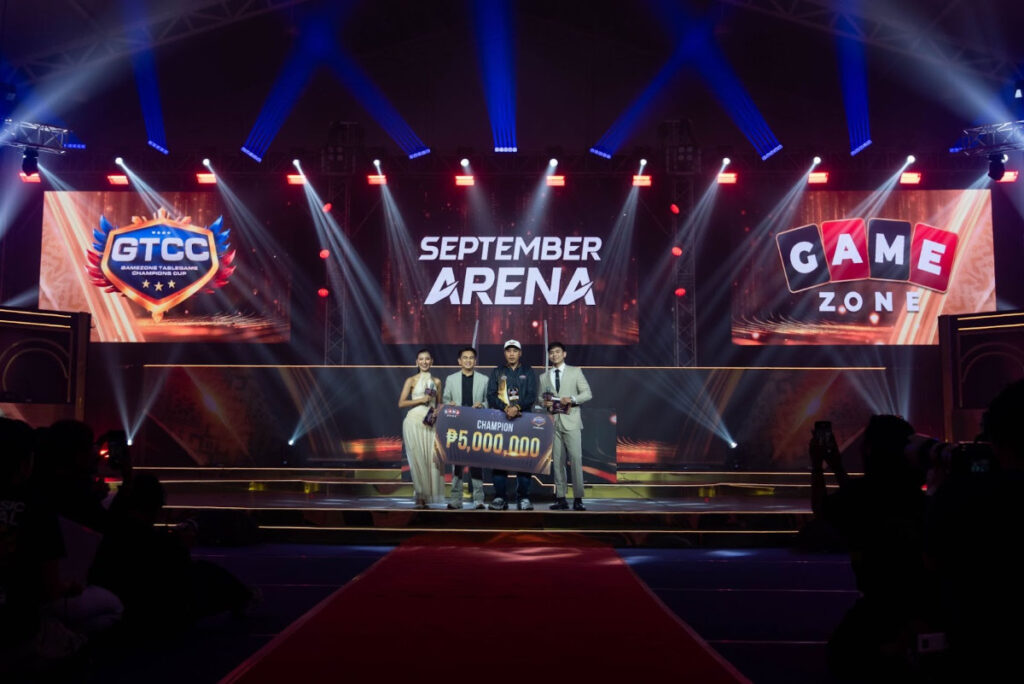 Gamemaster Integrated Inc. President, Mr. Rafael Jasper Vicencio presents the grand prize and trophy to the winner of the GTCC: September Arena